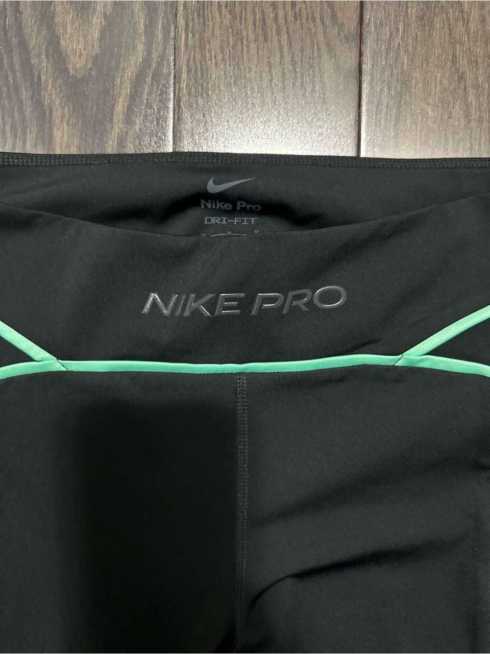 Nike Black Leggings with Mint Contrast Piping - Picture 2 of 4